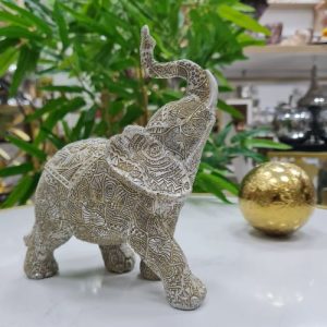 Escultura figura elefante budista mándala marfil dorado Felanas